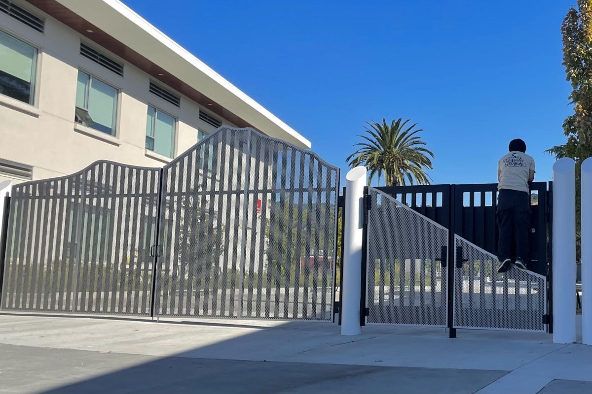 Students and Staff are Divided by the New Campus Gates